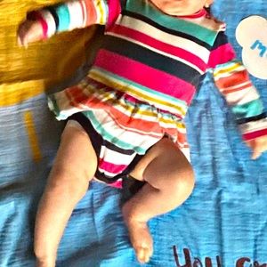 CARTER’s colorful striped onesie with skirt